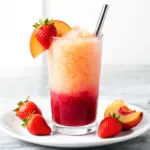 frozen strawberry peach mocktail slushie - featured image