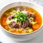 hearty beef and barley vegetable soup - featured image